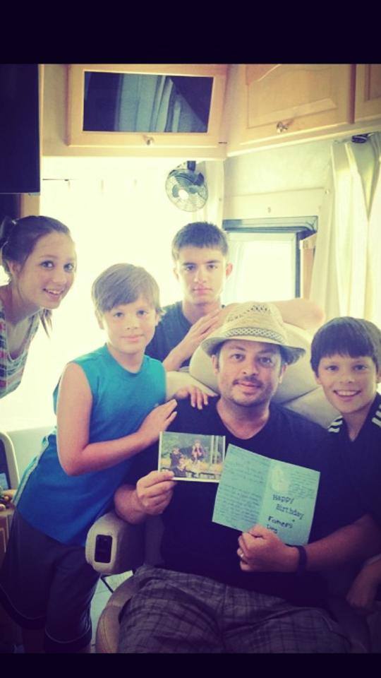 Eric Highland and His Kids with Gifts